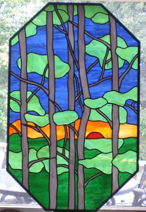 stained glass window of birch trees