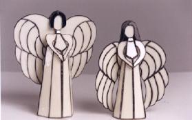 Angels in Cream 12" tall will accept candles