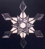 Stained Glass Snowflake with beveled tips and white and textured clear center 7 inces in diameter