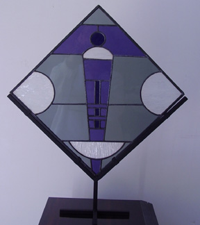 Abstract stained glass on metal stand purple and grey