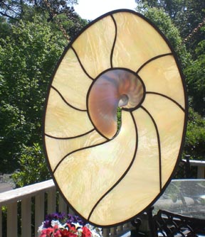 real shell stained glass oval 11 inches by 16 inches $130 irradized light yellow