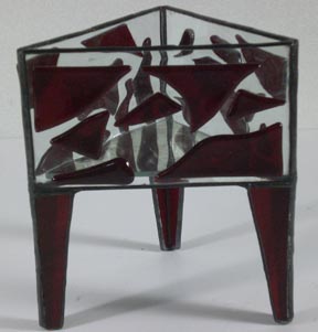 red glass candle holder